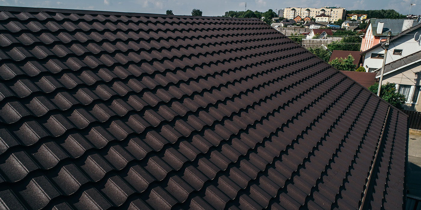 Металлочерепица НОРДО  ®, водосток металлический, цвет RAL 8019 (серо-коричневый) КВАРЦ